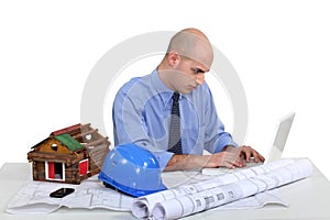 Architect sat at desk