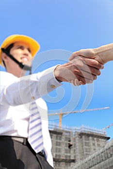 Architect shaking hands