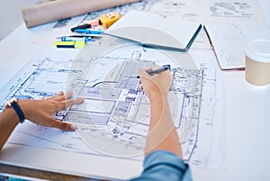 Architect sketching, planning or drawing an architectural design plan or blueprint diagram with draw tools, equipment