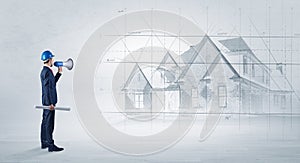 Architect standing with house plan