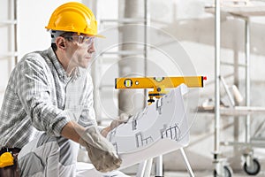 Architect structural engineer or builder with plan