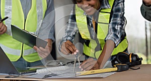 Architect team working with blueprints for architectural plan, engineer sketching a construction project on table in