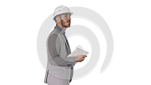 Architect walking with tablet and checking what is built on white background.