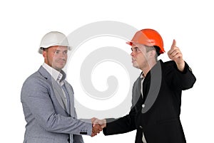 Architect welcoming a colleague and pointing