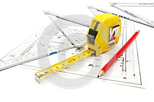 Architect work tools equipment on blueprint construction with measuring tape, pencil and wooden ruler