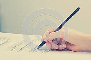 Architect working on blueprint. Architects