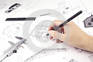Architect working on blueprint. Construction concept. Engineering tools. Architectural plan,technical project and constructions