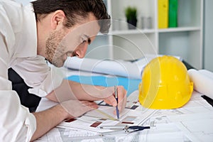 Architect working on his projects