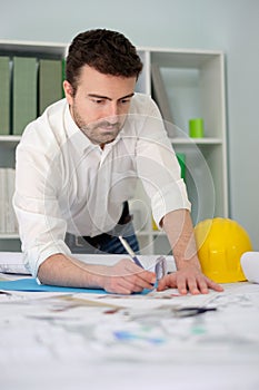 Architect working on his projects