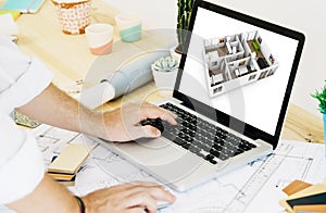 architect working with laptop cad