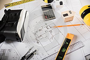 Architectural blueprint paper project plans on desk table