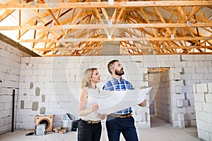 Architects and civil engineer at the construction site.