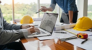 Architects and Engineers Collaborating on Construction Project