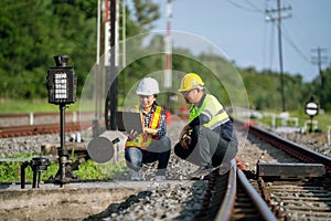 Architects and engineers work together at the railroad tracks