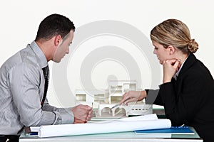 Architects evaluating a building photo
