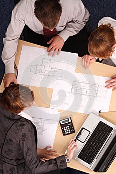 Architects studying plans photo