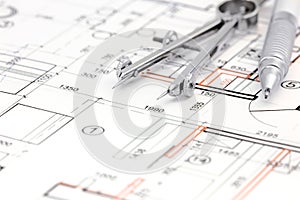 Architectural background with floor plan, drawing compass and pencil