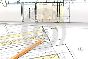 Architectural blueprints and house plan with pencil closeup