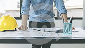 Architectural building design and construction plans with blueprints