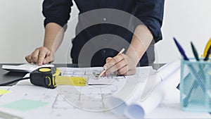 Architectural building design and construction plans with blueprints