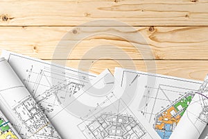 Architectural construction plans paper on table close up