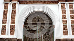 Architectural detail around the entrance of a historic church