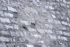 Architectural detail on a brick wall in Venice, Italy