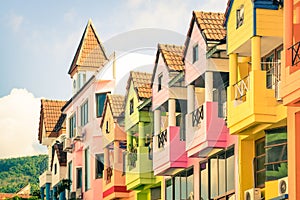 Architectural detail of multicolored vintage houses in Patong