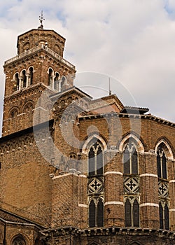 Architectural detail of an old church in Venice, Italy with detail of gothic windows