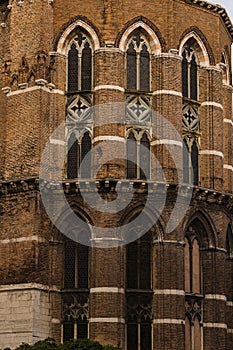 Architectural detail of an old church in Venice, Italy with detail of gothic windows