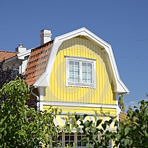 The architectural detail of a roofline on a home photo