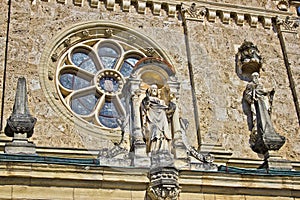 Architectural detail - window and saint statue