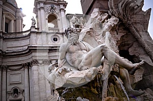 architectural detail Zeus statue of fountain in Piazza Navona Rome. Italy