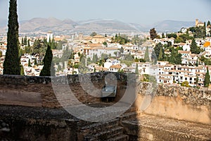 Architectural details of the Alhambra fortified palace complex and Granada city