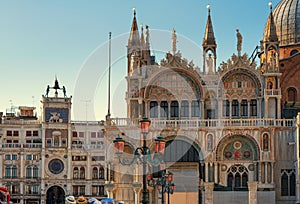 Architectural details of Basilica di San Marco and Ancient clock tower Torre dell`Orologio, Venice, Italy