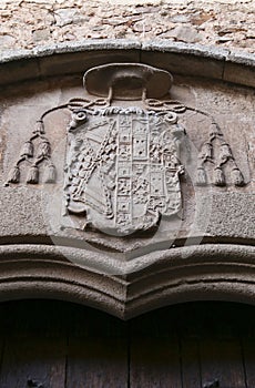 Architectural details and blazonry on the wall of The Episcopal Palace in Caceres
