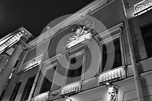 Architectural details of a historic building with lighting