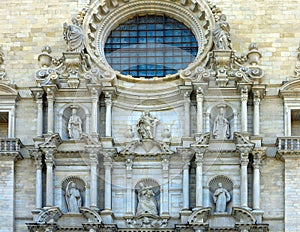 Architectural details of the medieval facade of the Saint Mary cathedral of the Gerona city photo