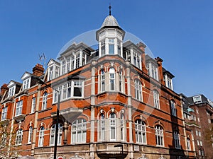 Architectural details of old brick wall facade of building in London