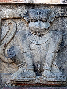 Architectural details of stone carvings of lion in ancient Hindu Temple photo