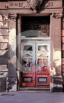 Door urban with graffiti and street art of the old house