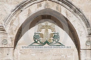 An architectural frame in the form of an arch on a Catholic cathedral cross religion