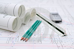 Architectural plans and drawing utensils