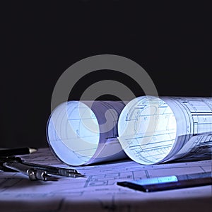 Architectural plans an office at dawn