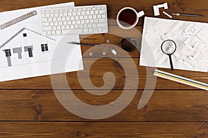 Architectural project, engineering tools on table.