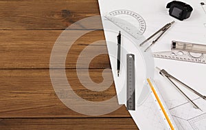 Architectural project, engineering tools on table.