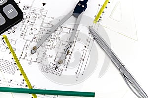 Architectural project, pair of compasses, rulers and calculator