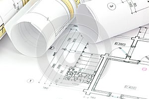 Architectural project, technical drawing, blueprint rolls on plan