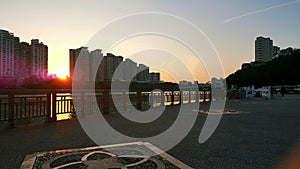 The architectural scenery along the river in the twilight.