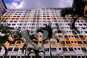 Architectural shot of public housing HDB flats in Singapore on sunny day. Dynamic angle; abstract; graphic; background